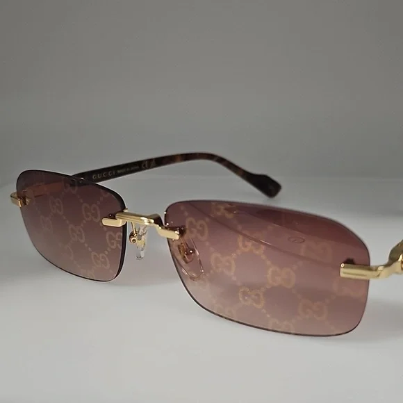 GUCCI UNISEX GG1221S 004 GUCCI RIMLESS GG LOGO ON LENS SUNGLASSES - Picture 2 of 13